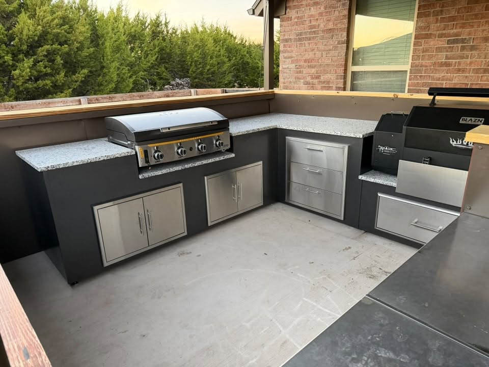 Premium stainless steel grill on a covered patio